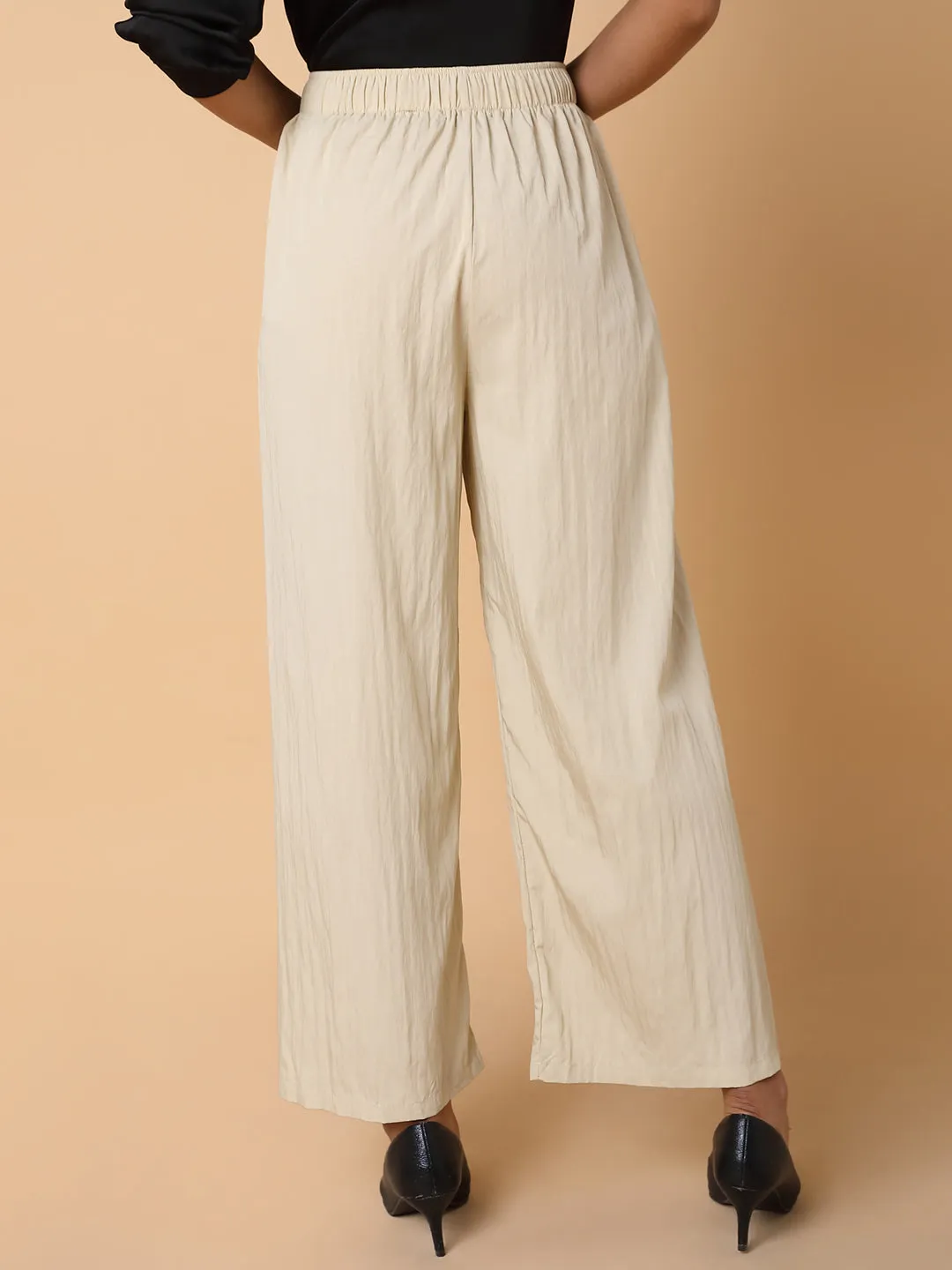 Women Solid Cream Straight Trouser